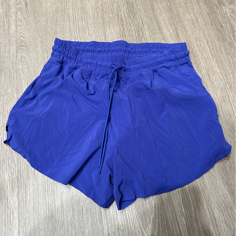 Athleta shorts. Never worn. Size M.
